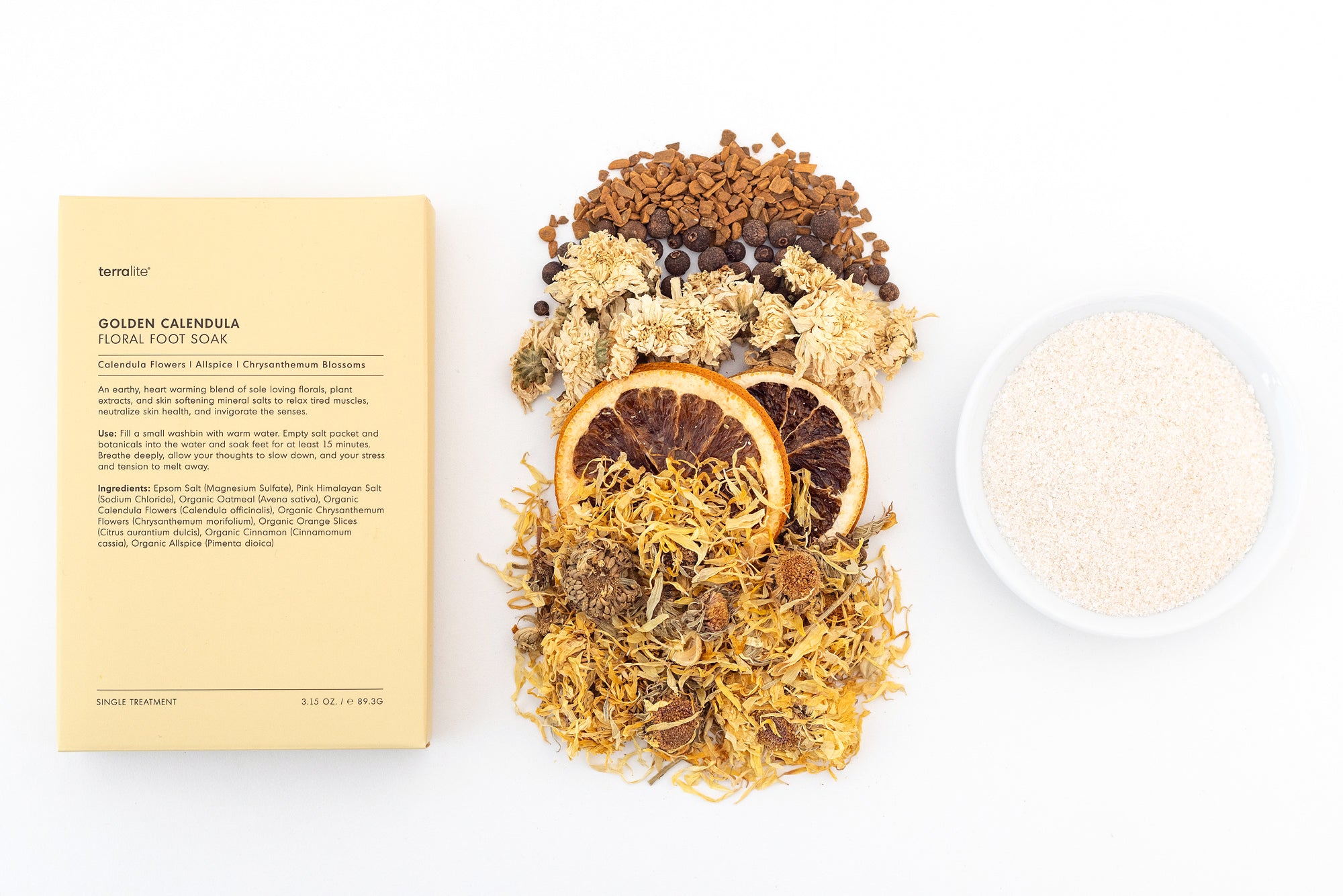 Organic Golden Calendula Foot Soak with fall autumn botanicals, calendula flowers, allspice, orange slices, chrysanthemum blossoms, cinnamon.