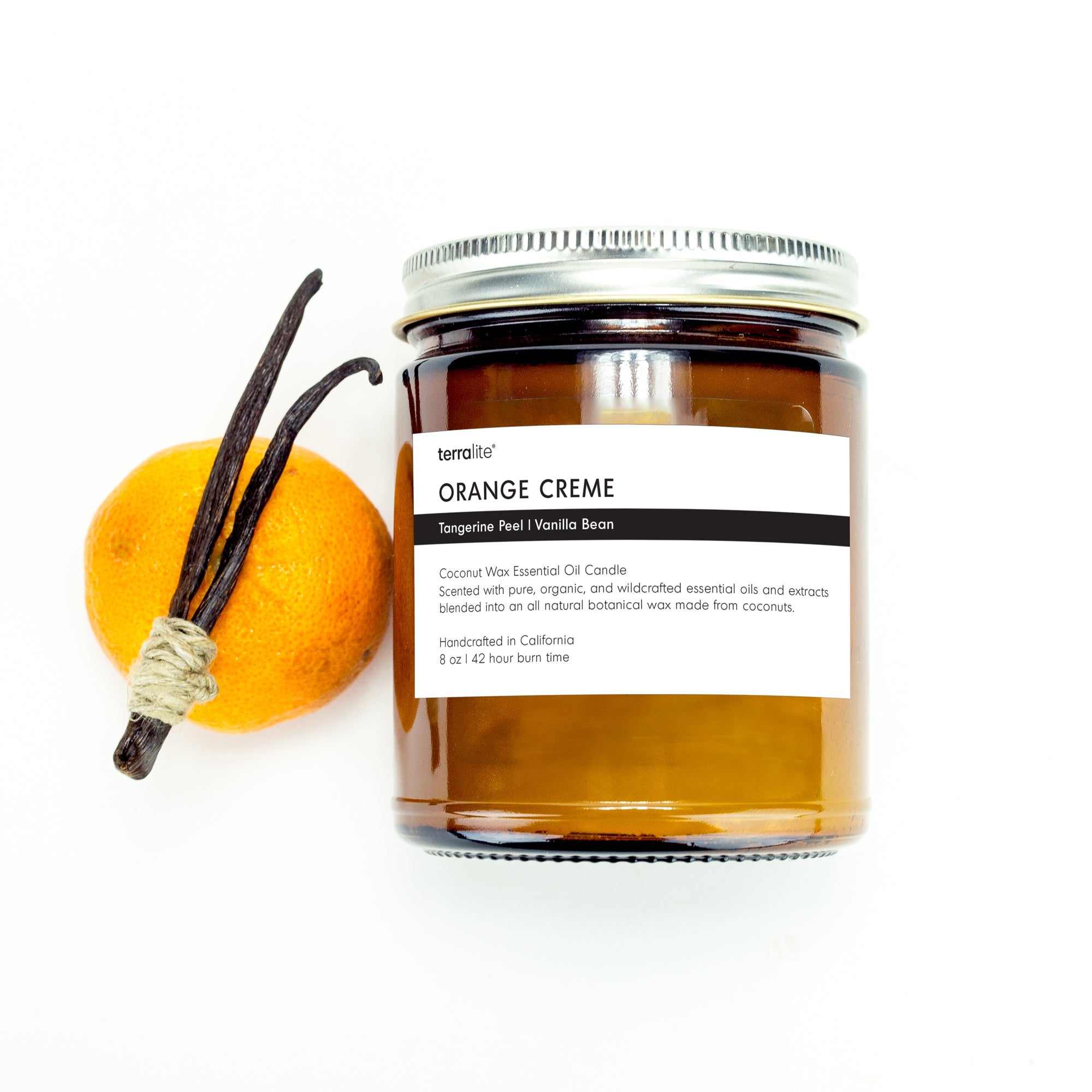Orange Creme essential oil candle scented with Sweet Orange, Tangerine, and Vanilla essential oils and plant extracts.
